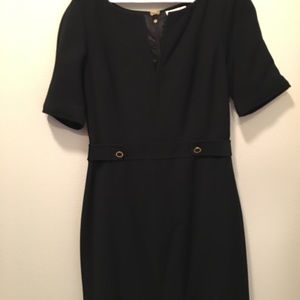 Black dress with gold buttons